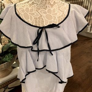 JCrew pretty ruffled top, size 2. A super versatile piece, EUC and dry cleaned.